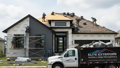 Roof replacement and vinyl siding installation by Next Level Exteriors in Boston, MA